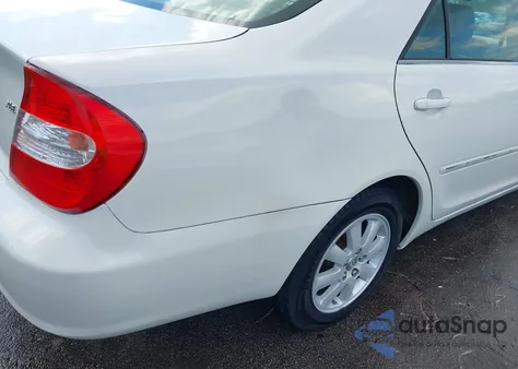 2003 Toyota Camry Xle z USA, uszkodzony, nr VIN 4T1BE30K03U192283